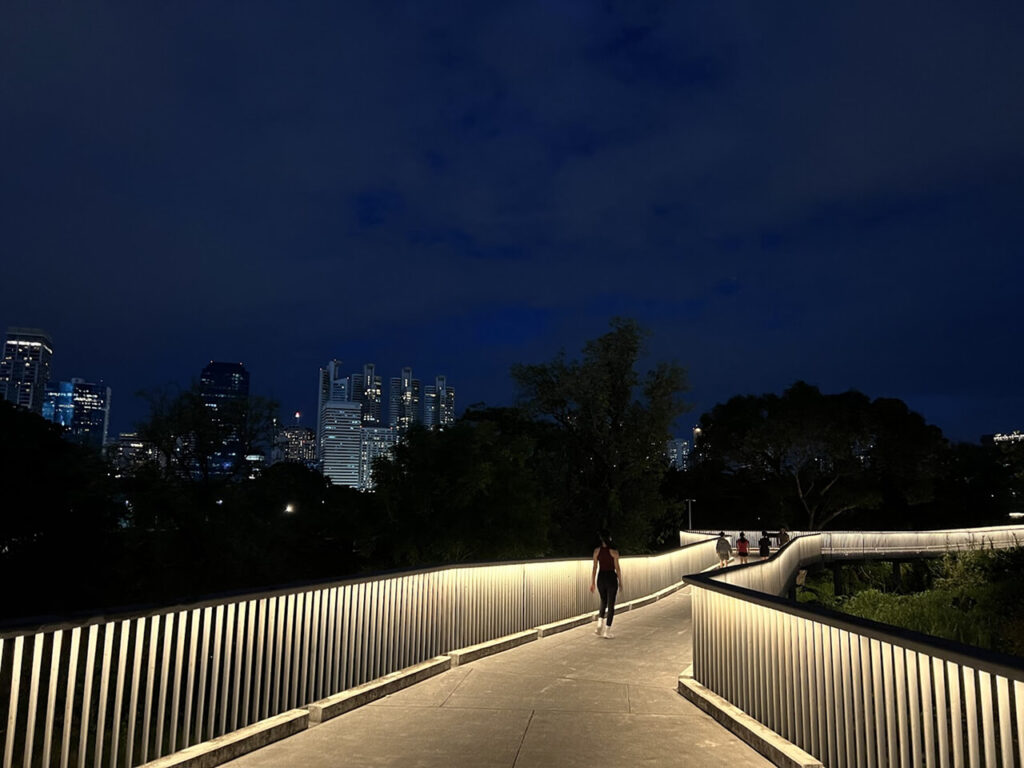Benjakitti Park's illuminated bridge at night