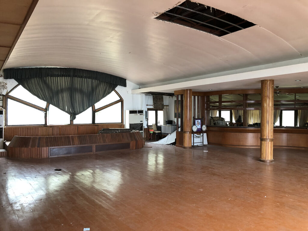 Abandoned second-floor bar inside a ship-themed cottage at Grand Lagoona Resort, Koh Chang