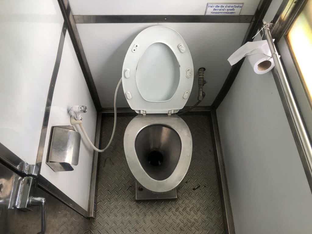 Toilet in second class carriage on Express train in Thailand