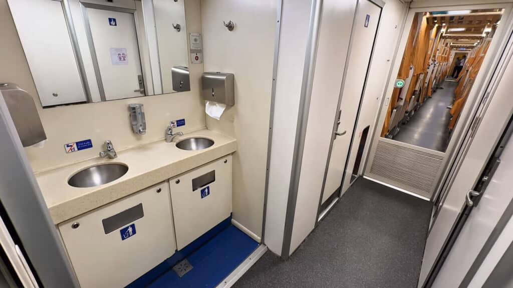 Restroom in second class carriage on Special Express CNR train in Thailand