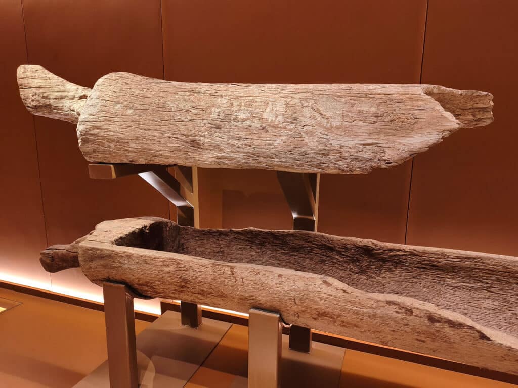 Log coffin made from a single tree trunk. Iron Age, 1,000–2,600 years ago.
