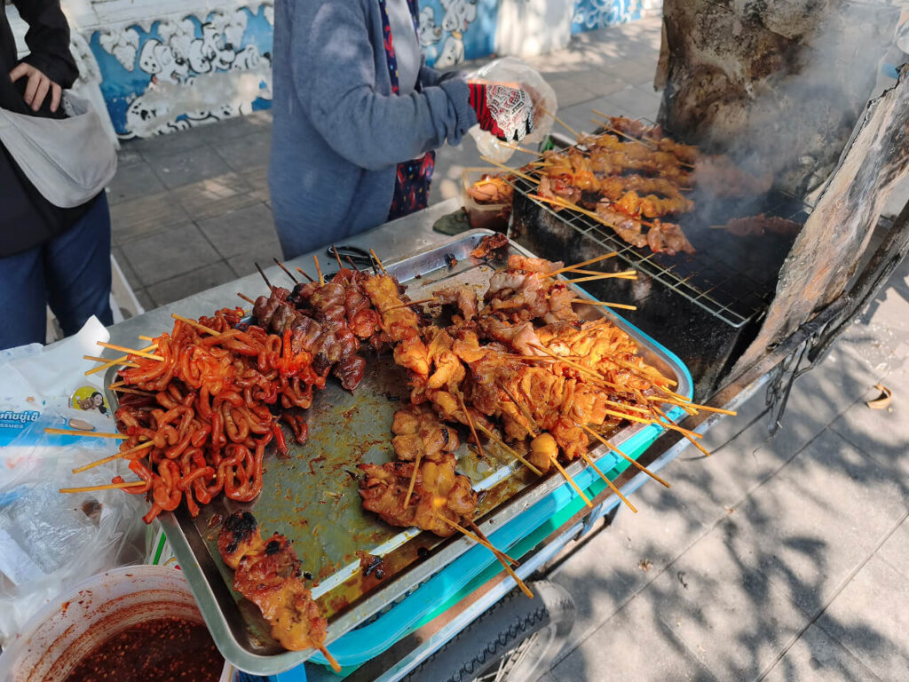 Chicken skewers at the southern entrance to Queen Sirikit Park
