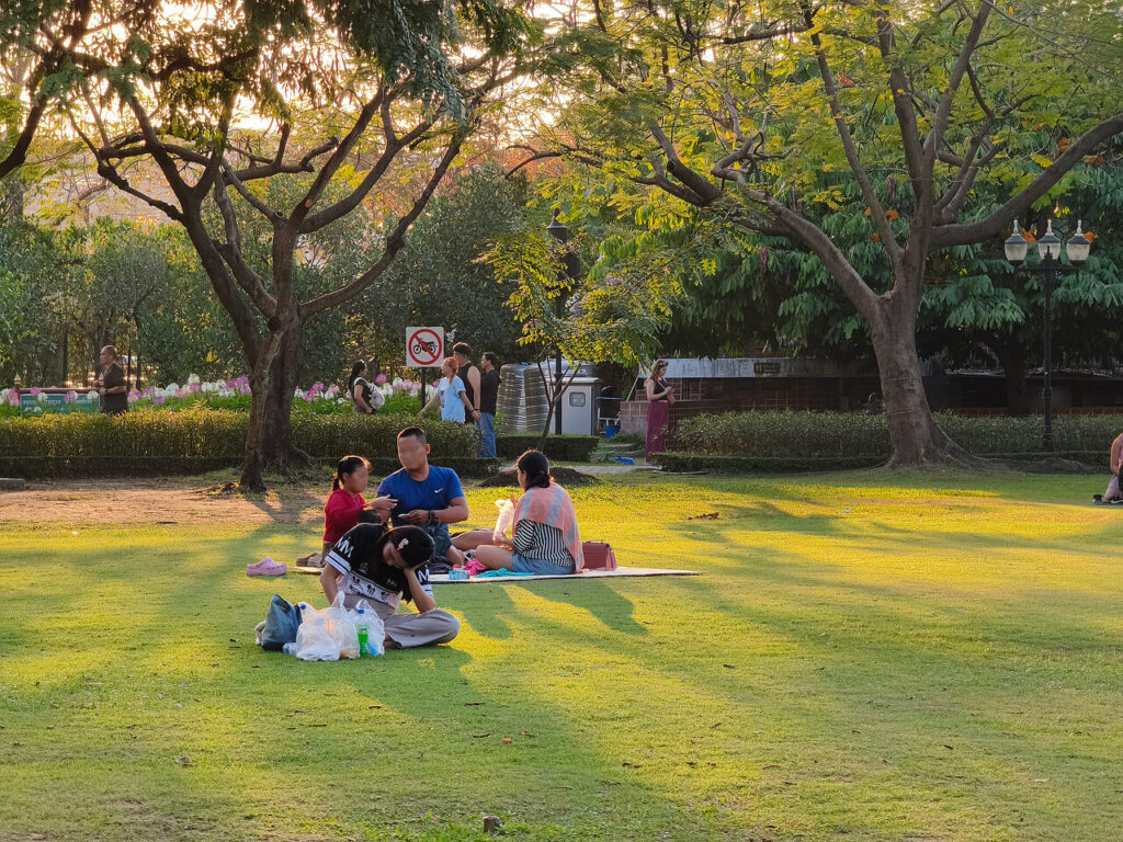 People hacing picnic in Queen Sirikit Park