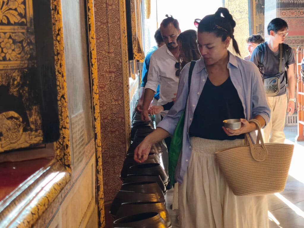 108 bronze bowls behind the reclining Buddha in Bangkok