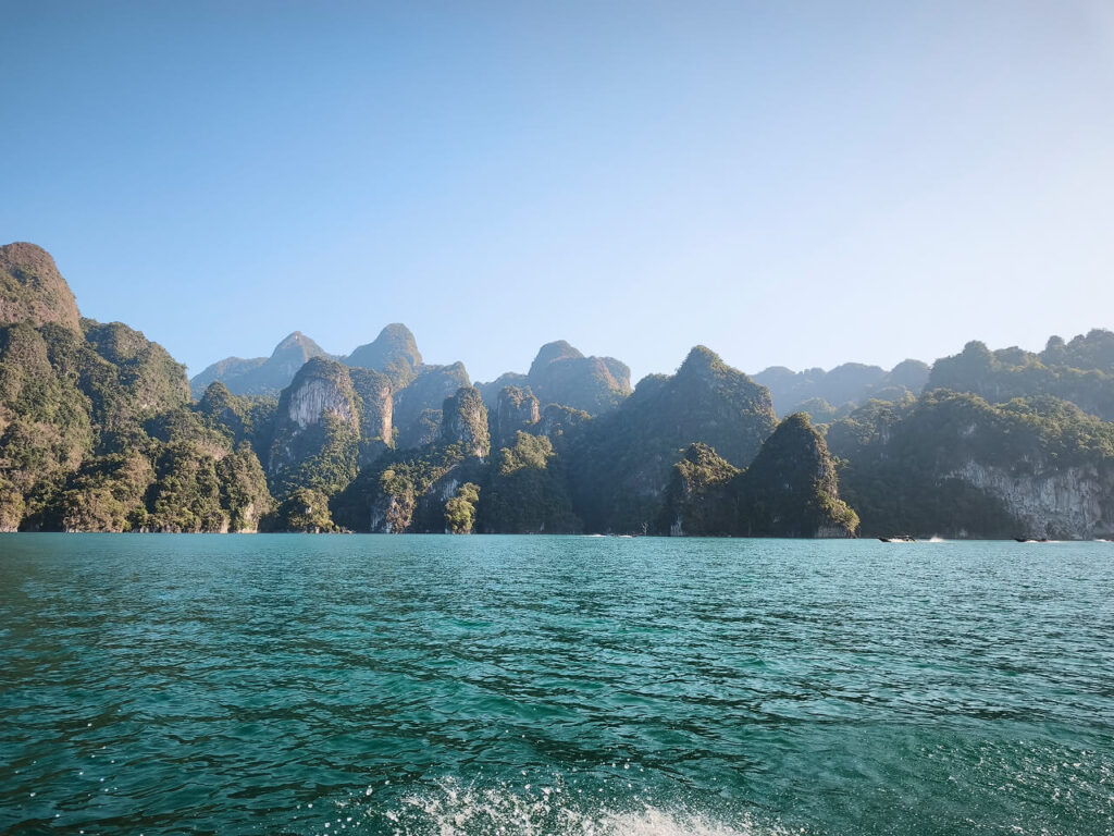 Limestone cliffs rising from Cheow Lan Lake in Khao Sok National Park