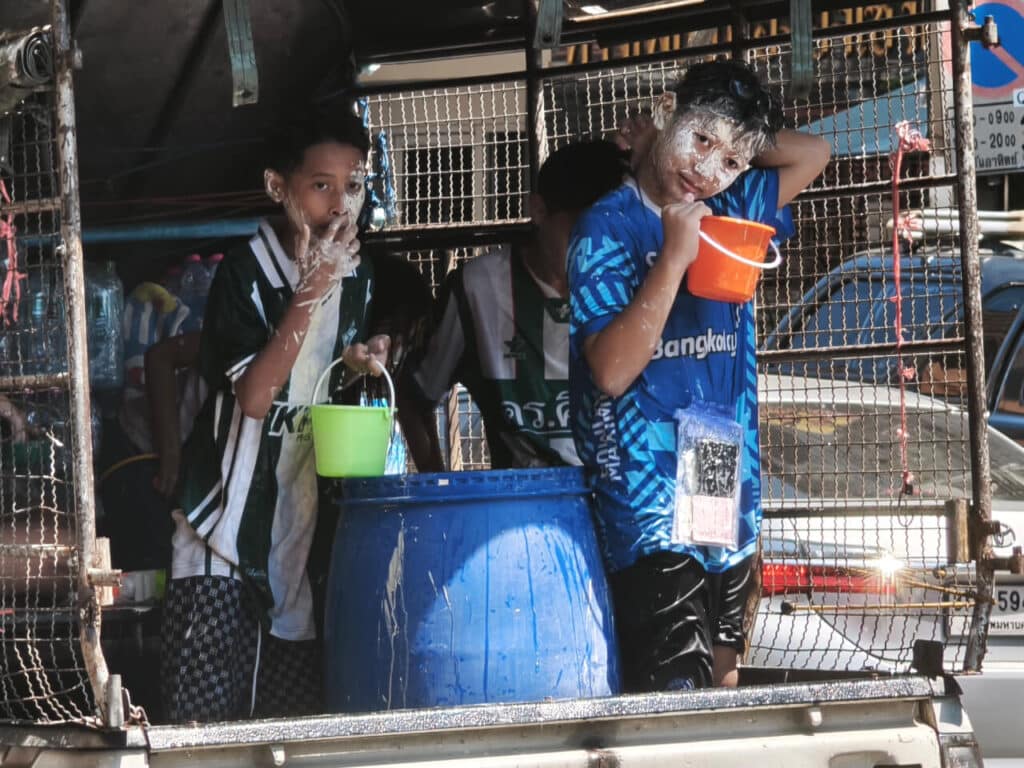 People smeared themselves with white clay (Din sor Pong) during Songkran