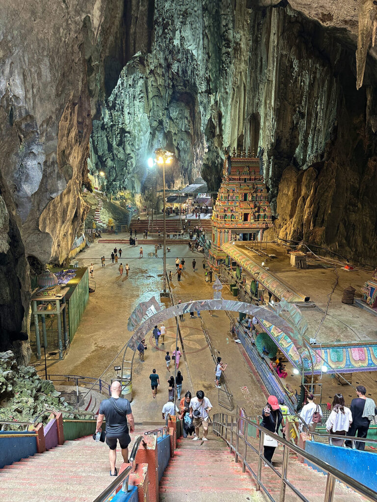 Hindu temples inside Batu Caves beneath a massive limestone cavern
